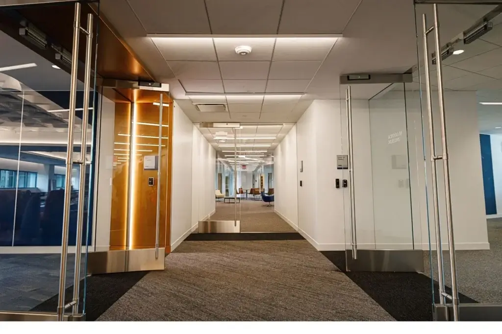 All glass entrance doors with concealed closers into a dining hall