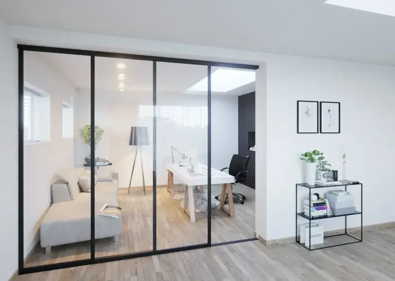 Black-framed glass partition enclosing a home office