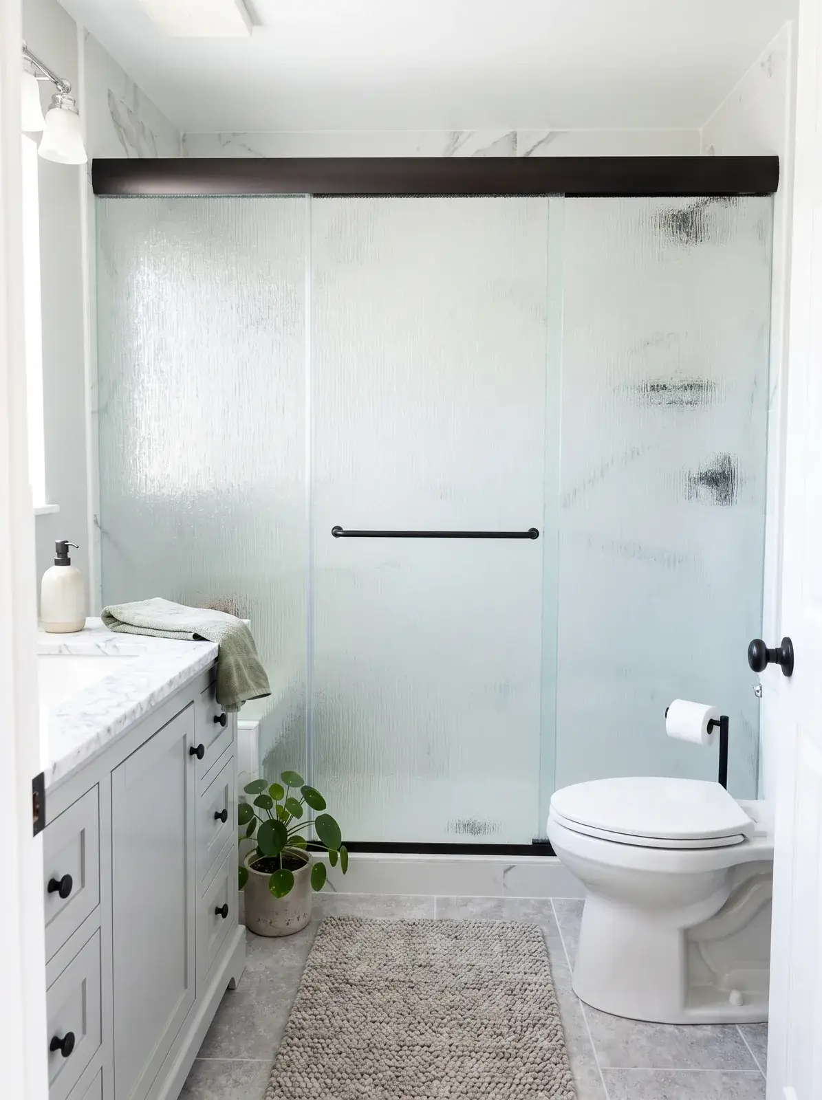 CRL Cottage DK Series bypass sliding shower door in rain glass