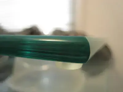 Close-up of a pencil polished glass edge