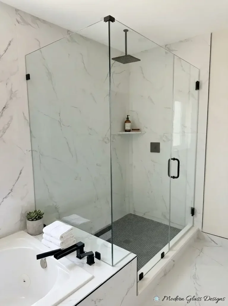 Frameless corner shower on a tub deck with matte black hardware