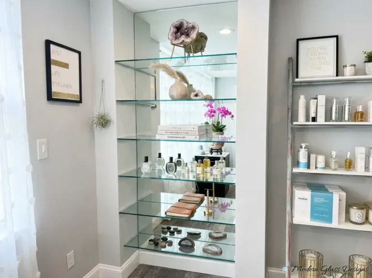 Glass shelves in a lighted wall niche