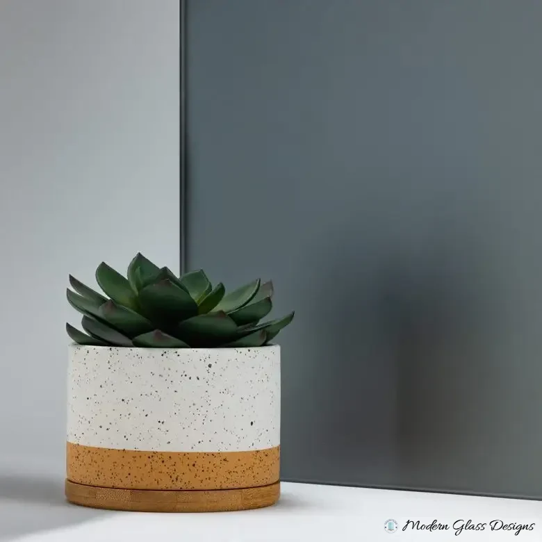 Pearl Grey Satin Etched Mirror sample with a soft, diffused reflection