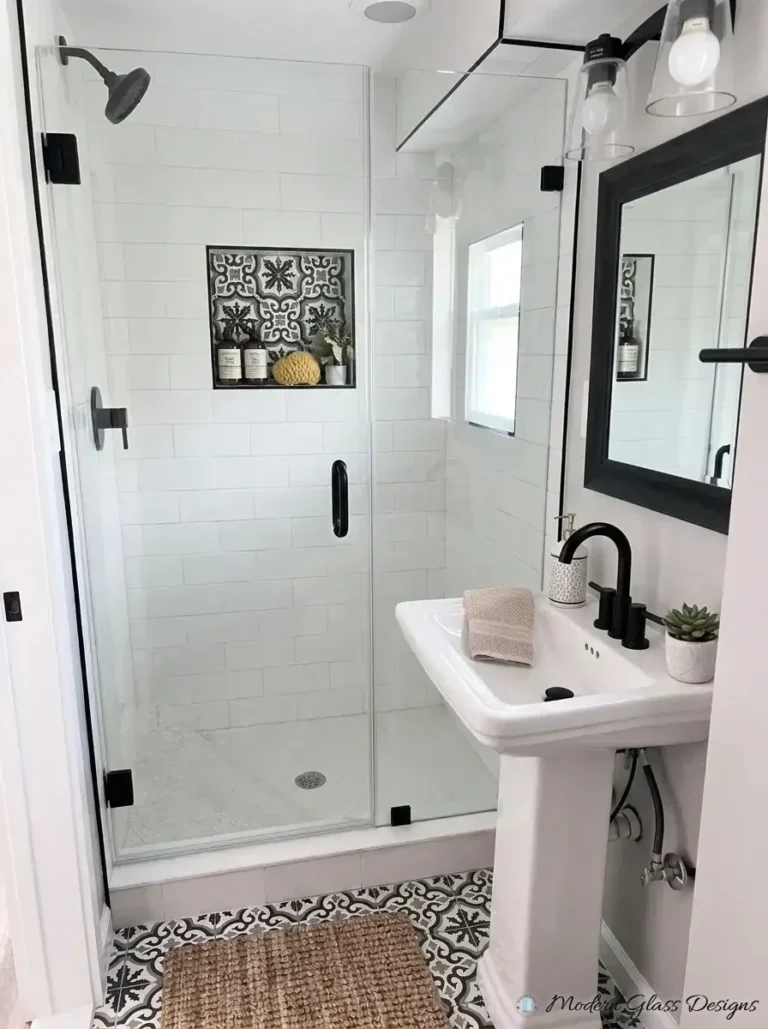 Frameless inline shower door and panel with matte black hinges and pull