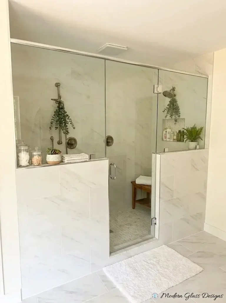 Frameless glass panels on two knee walls with a center door and header bar