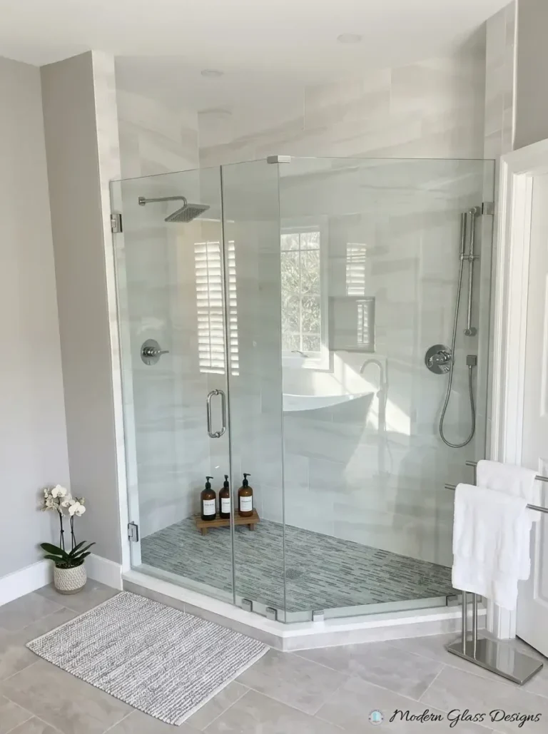 Frameless neo-angle shower enclosure with brushed nickel hinges