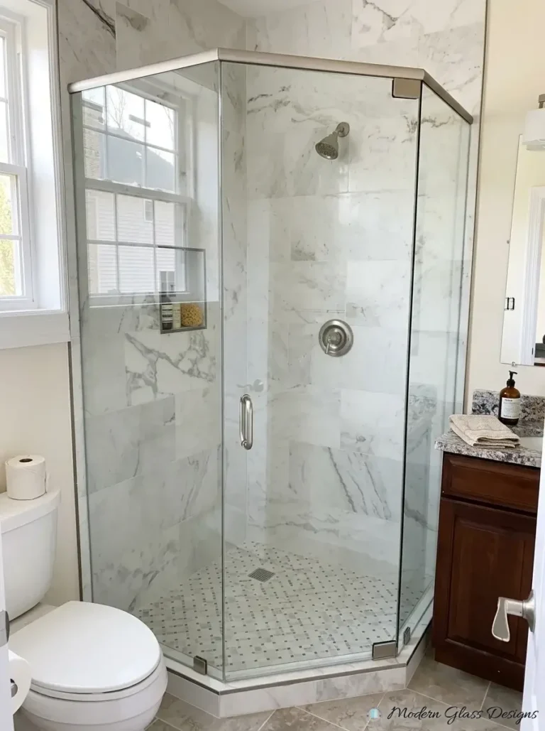 Neo-angle glass shower enclosure with brushed nickel header bar