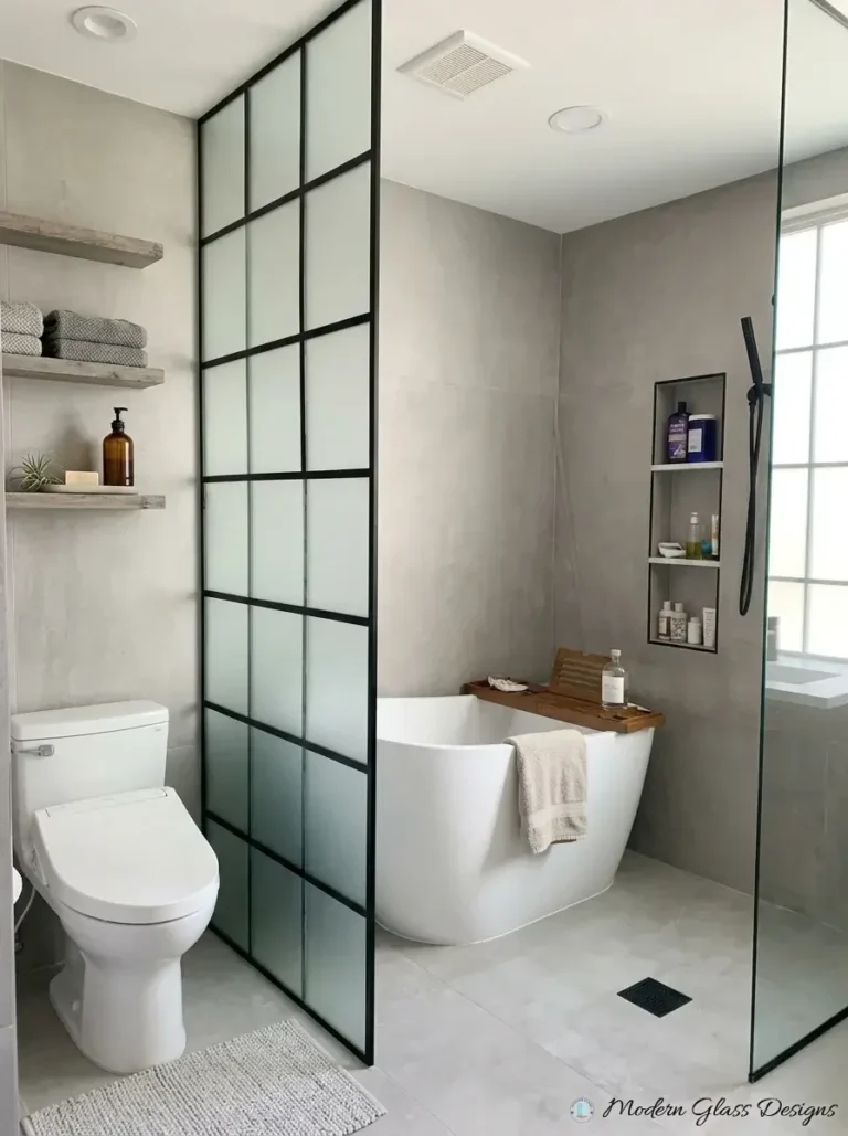 Black grid glass panel beside a freestanding tub